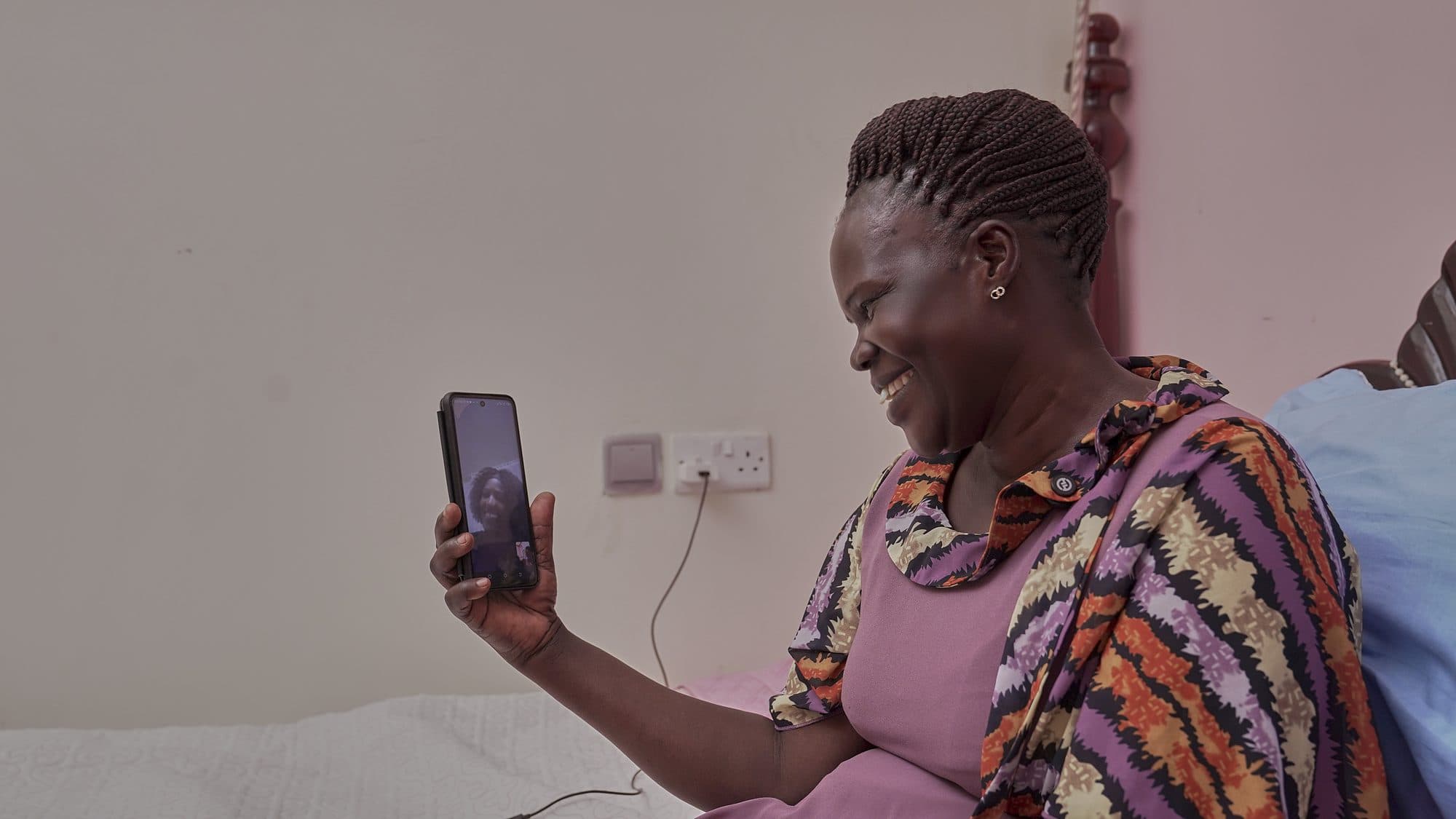 An elderly patient connecting with family